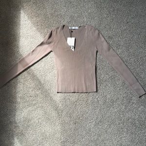 Cute ribbed long sleeve shirt from Zara! Never worn, new with tags!